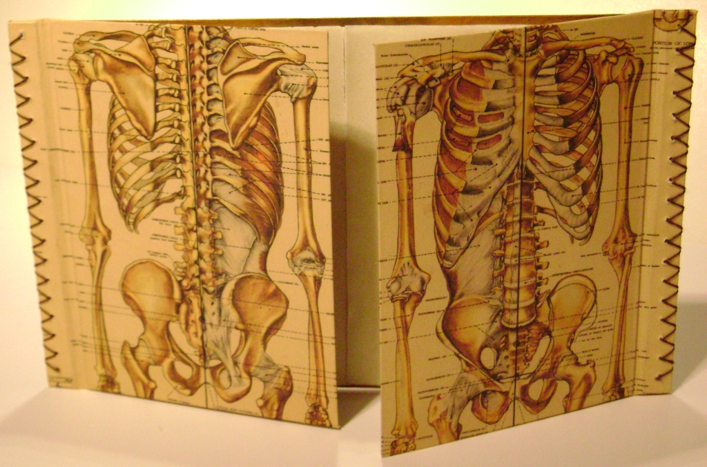 French door artist book. Paper, waxed thread, drawings on parchment; 2007.